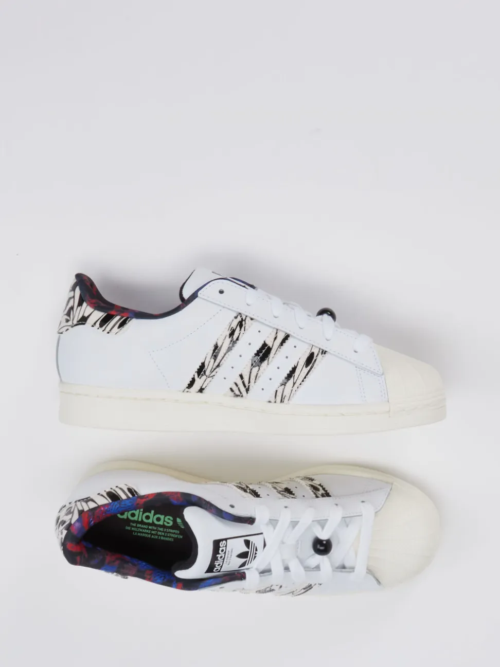 Adidas – Sneaker aus Synthetik in Weiß mit Grafikprint