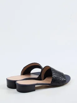 Andrea Puccini – Mules aus Flechtleder in Schwarz