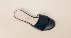 Andrea Puccini – Mules aus Flechtleder in Schwarz