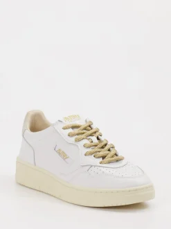 Autry – Sneaker aus Kalbleder mit Goldakzenten