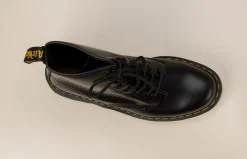 Dr. Martens – Schnürboots aus Kalbleder Schwarz