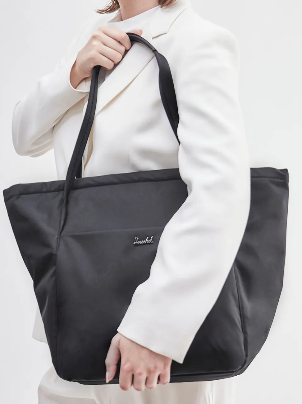 Herschel – Shopper aus recyceltem Polyester Schwarz