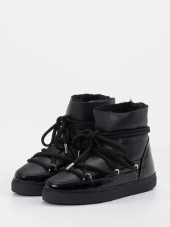 Inuikii – Stiefeletten aus Kalbleder und Lackleder schwarz