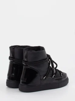 Inuikii – Stiefeletten aus Kalbleder und Lackleder schwarz