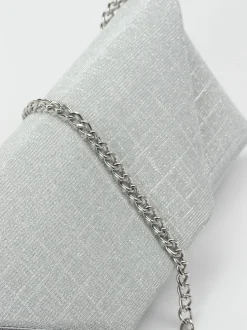Konstantin Starke – Clutch aus Metallic-Textil silber