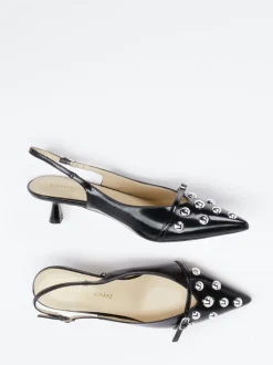 Konstantin Starke – Slingback-Pumps aus Lackleder Schwarz