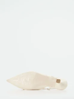 Konstantin Starke – Slingback-Pumps aus Lackleder cremeweiß