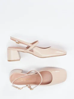 Konstantin Starke – Slingback-Pumps aus Lackleder beige