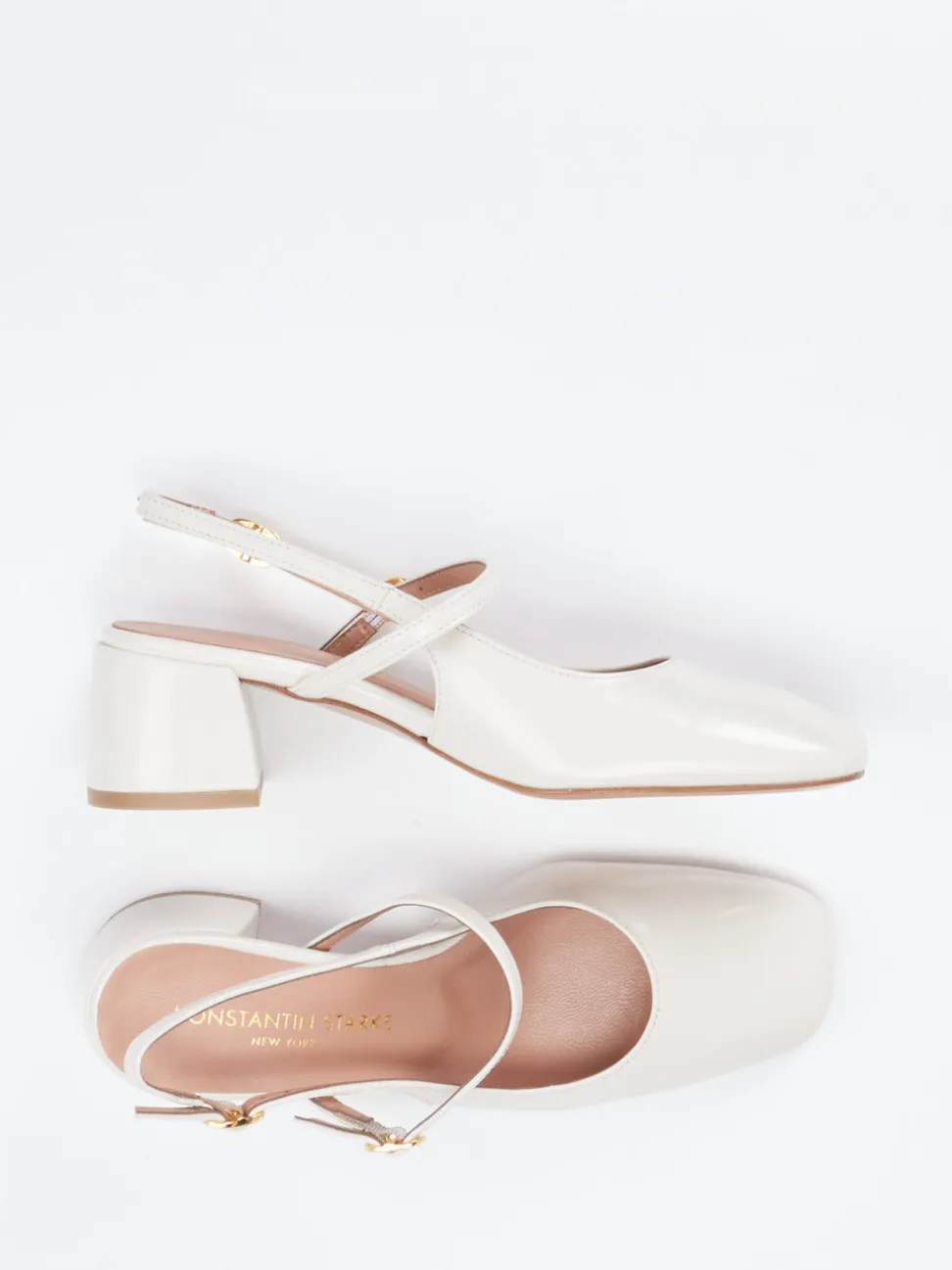 Konstantin Starke – Slingback-Pumps aus Lackleder cremeweiß