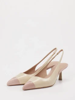 Konstantin Starke – Slingback-Pumps aus Lackleder Cremebeige