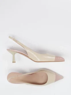 Konstantin Starke – Slingback-Pumps aus Lackleder Cremebeige