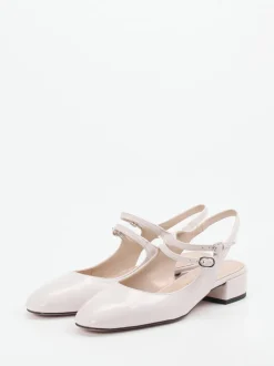 Konstantin Starke – Slingpumps aus Lackleder cremeweiß