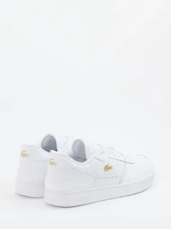 Lacoste – Sneaker aus Glattleder weiß mit Goldakzenten