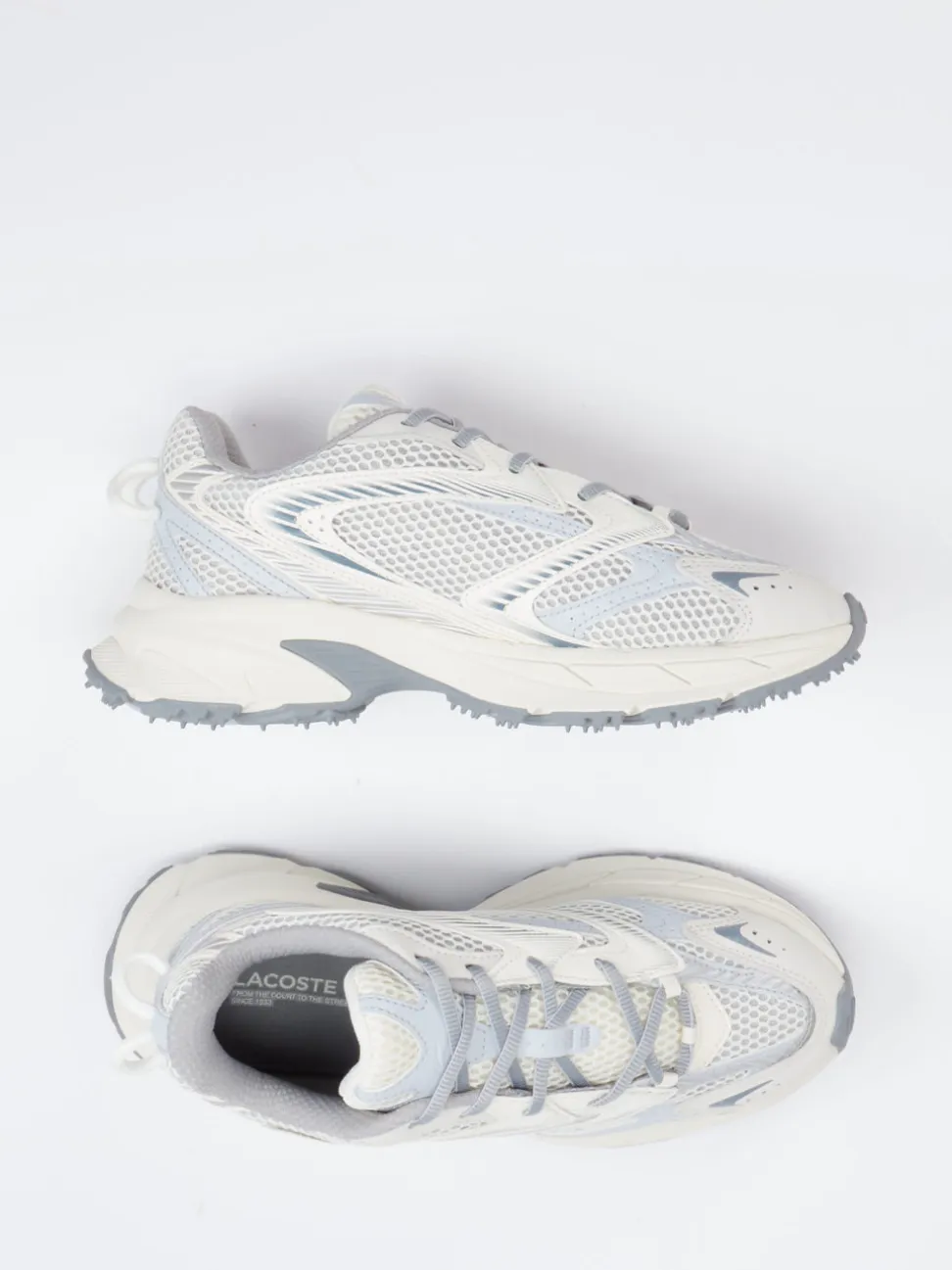 Lacoste – Sneaker aus Textil in Offwhite