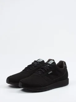 Lunge – Sneaker aus Textil in Veloursoptik schwarz