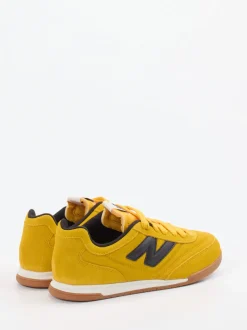 New Balance – Sneaker aus Veloursleder Senfgelb