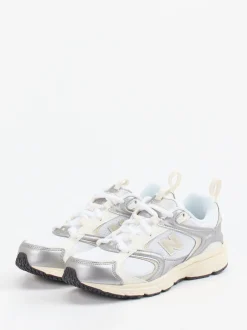 New Balance – Sneaker aus Textil in Offwhite