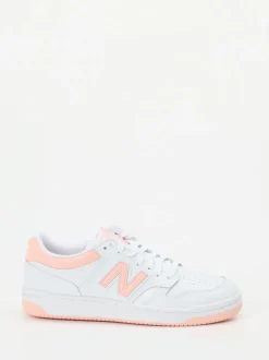 New Balance – Sneaker aus Leder in Weiß Pfirsichrosa