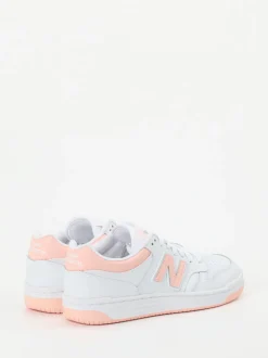 New Balance – Sneaker aus Leder in Weiß Pfirsichrosa
