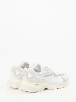 Puma – Chunky Sneaker aus Textil und Wildleder Offwhite