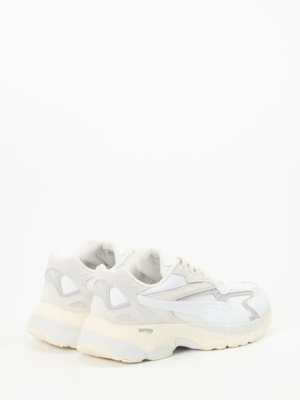 Puma – Chunky Sneaker aus Textil und Wildleder Offwhite