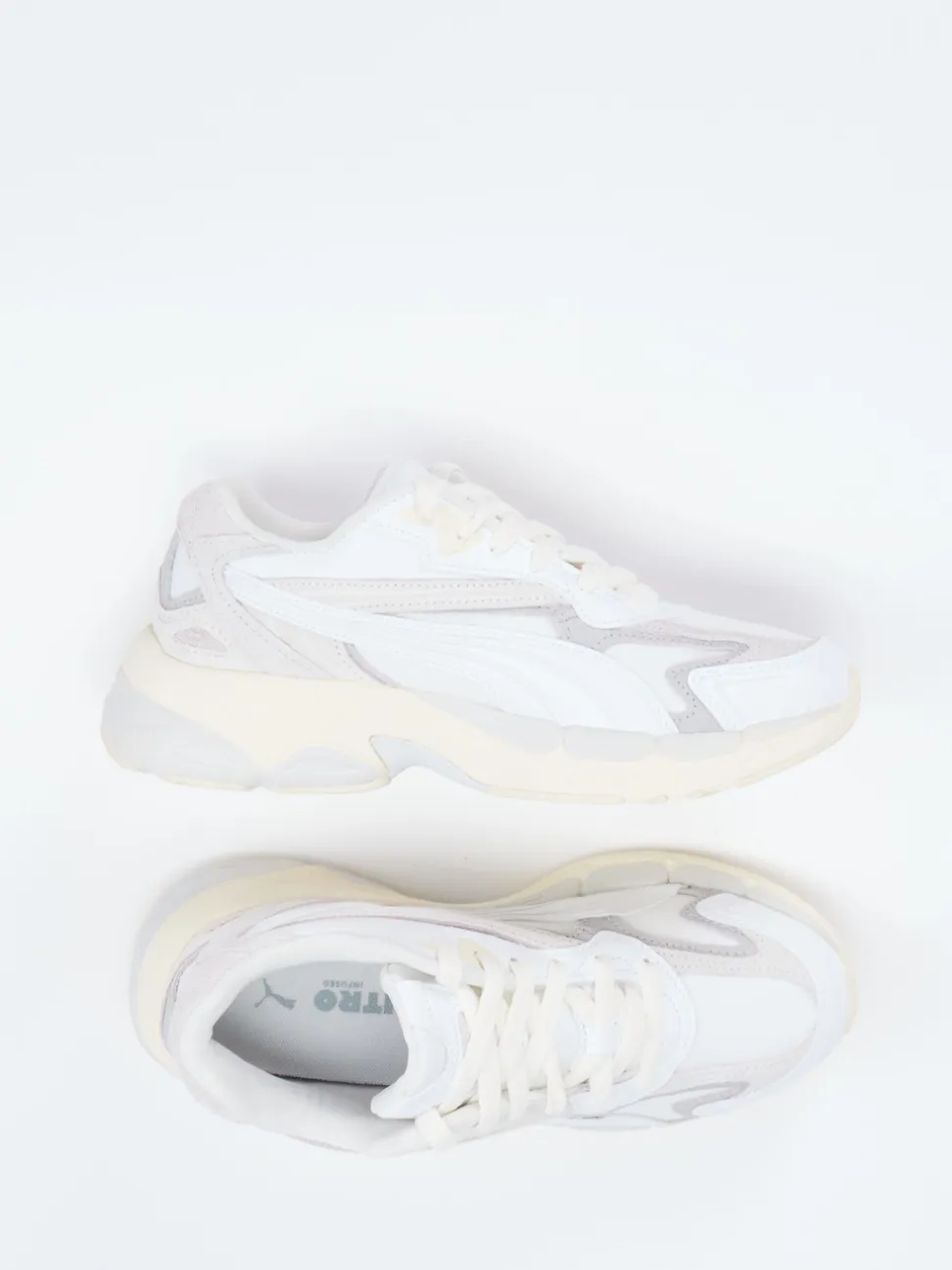 Puma – Chunky Sneaker aus Textil und Wildleder Offwhite