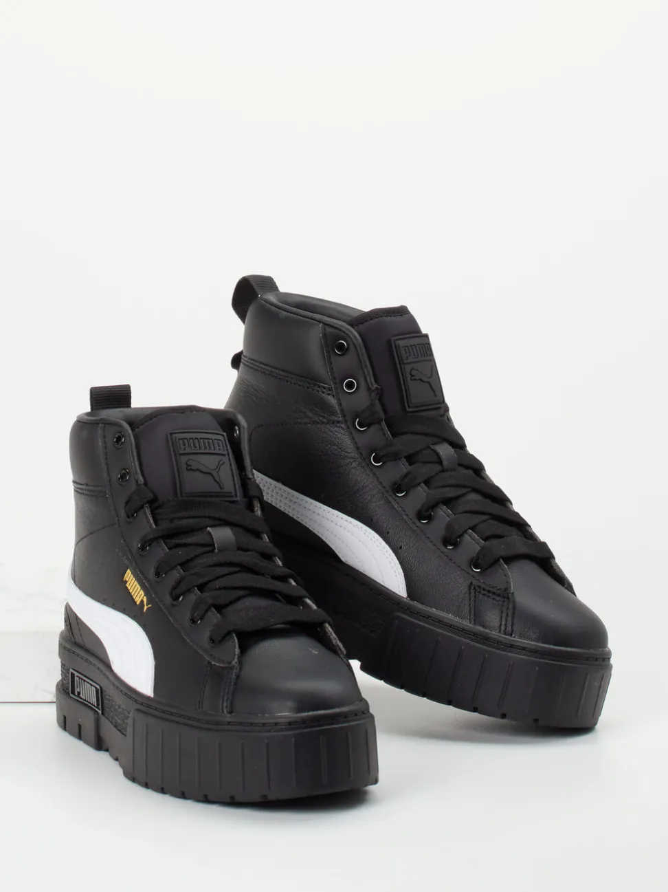 Puma – High-Top Sneaker aus Leder in Schwarz