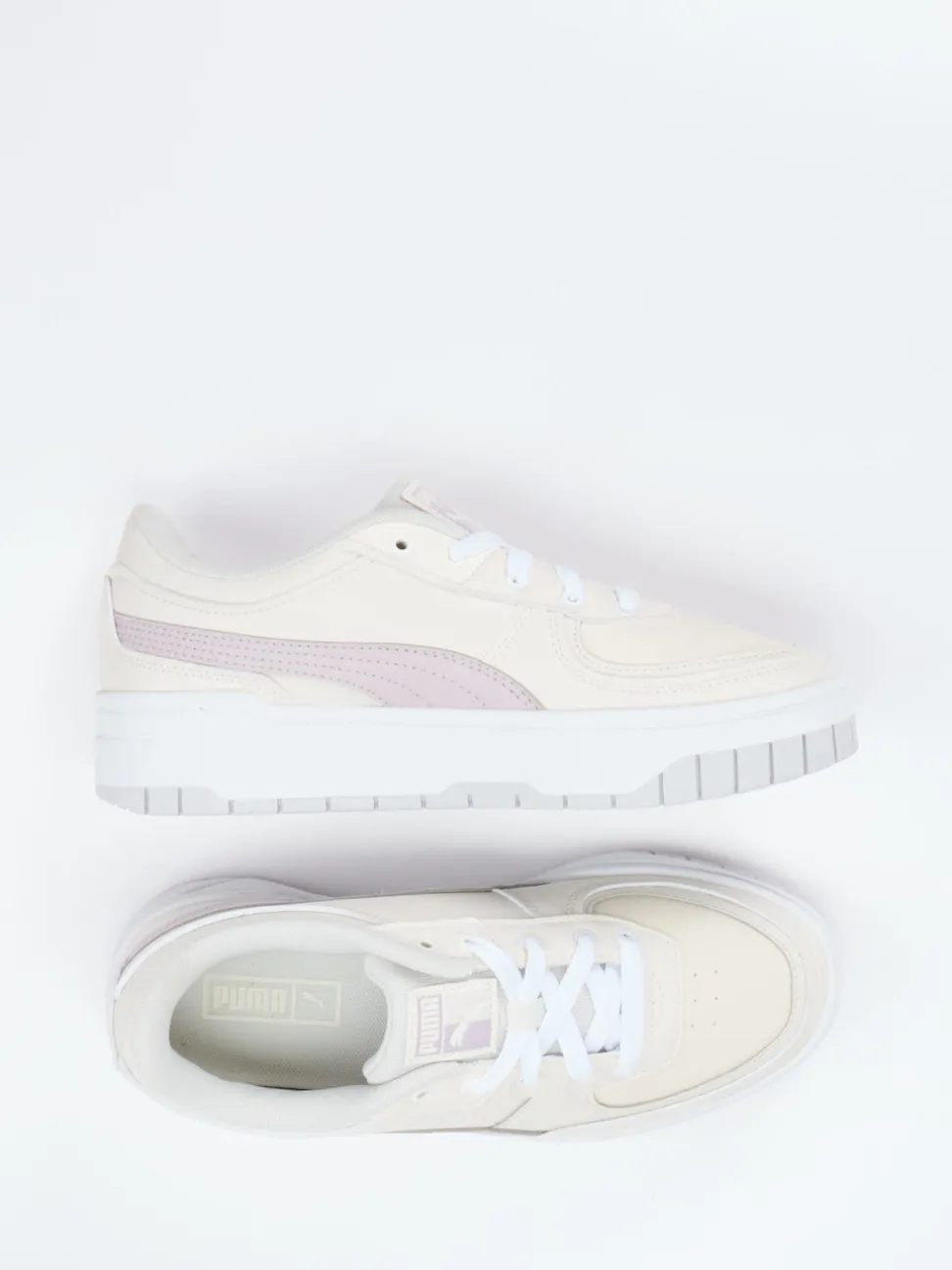 Puma – Platform Sneaker aus Leder in Cremeweiß