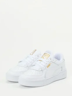 Puma – Sneaker aus Glattleder Weiß mit Goldakzenten