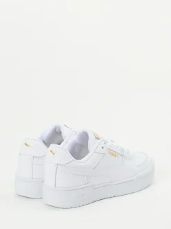 Puma – Sneaker aus Glattleder Weiß mit Goldakzenten