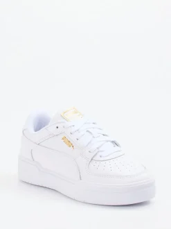 Puma – Sneaker aus Glattleder weiß mit Golddetails