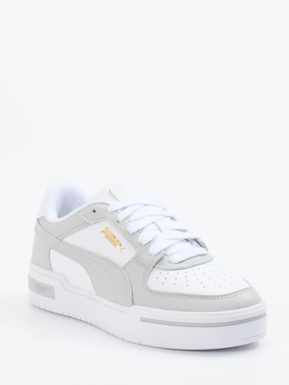 Puma – Sneaker aus Leder in Weiß mit Retro-Flair
