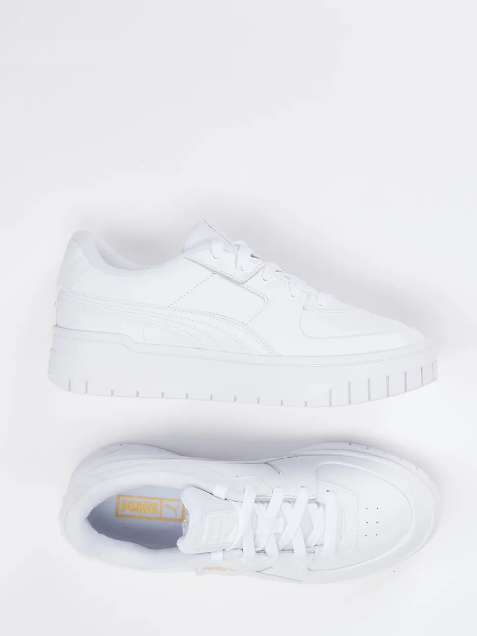 Puma – Sneaker aus Leder in Weiß mit Goldlogos