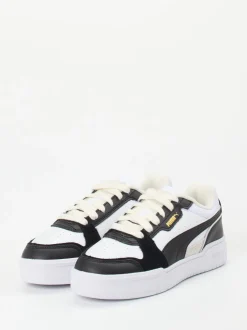 Puma – Sneaker aus Leder in Weiß mit Gold-Details