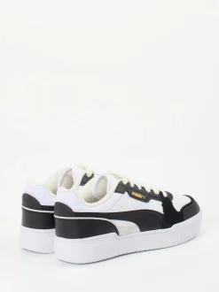 Puma – Sneaker aus Leder in Weiß mit Gold-Details