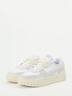 Puma – Sneaker aus Leder in Beige-Weiß