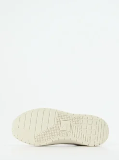 Puma – Sneaker aus Leder in Beige-Weiß