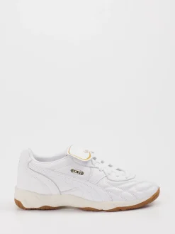 Puma – Sneaker aus Leder in Weiß mit Gold-Detail