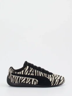 Puma – Sneaker aus Veloursleder und Fellstruktur schwarz