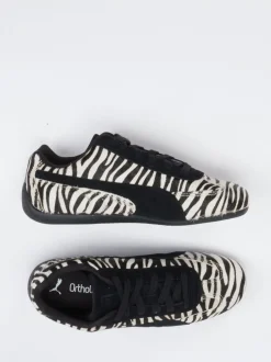 Puma – Sneaker aus Veloursleder und Fellstruktur schwarz