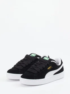 Puma – Sneaker aus Veloursleder Schwarz Retro-Look