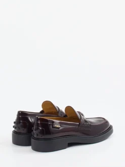 Tod's – Loafer aus Hochglanzleder in Burgunder