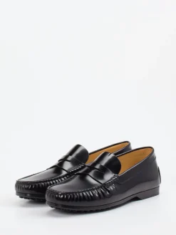 Tod's – Penny Loafer aus Hochglanzleder schwarz