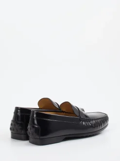 Tod's – Penny Loafer aus Hochglanzleder schwarz