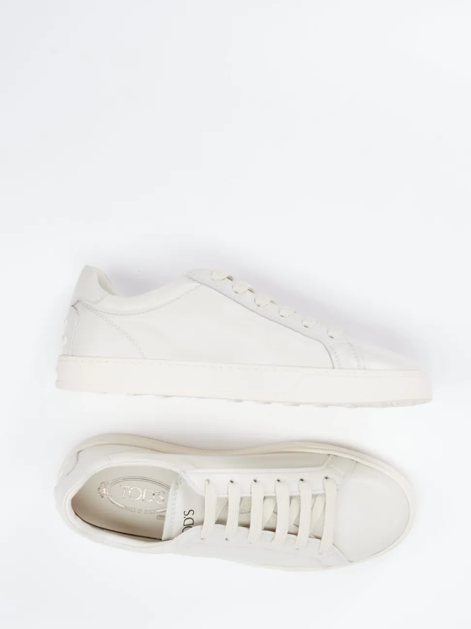 Tod's – Sneaker aus Kalbleder cremeweiß
