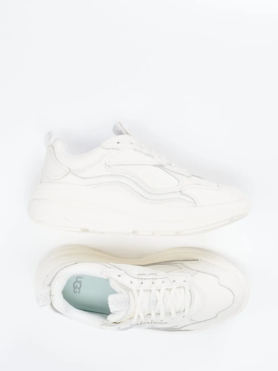 UGG – Chunky Sneaker aus Kalbleder in Cremeweiß