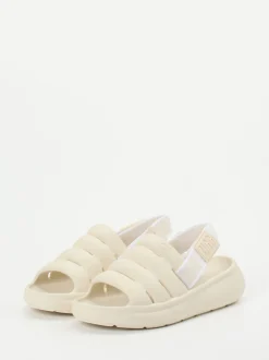 UGG – Chunky-Sandale aus Lammleder Cremebeige