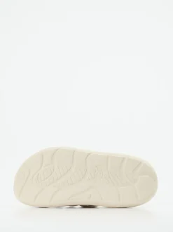 UGG – Chunky-Sandale aus Lammleder Cremebeige