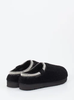 UGG – Hausschuh aus Fell in Schwarz mit Bouclé