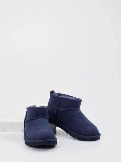 UGG – Lammfell-Boots aus Veloursleder dunkelblau
